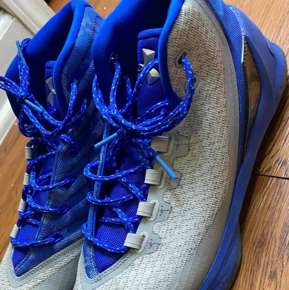 Silver and blue under armour shoes